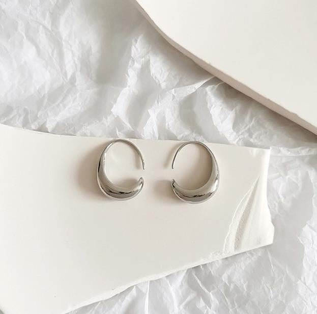 Elegante Ohrringe in Gold und Silber